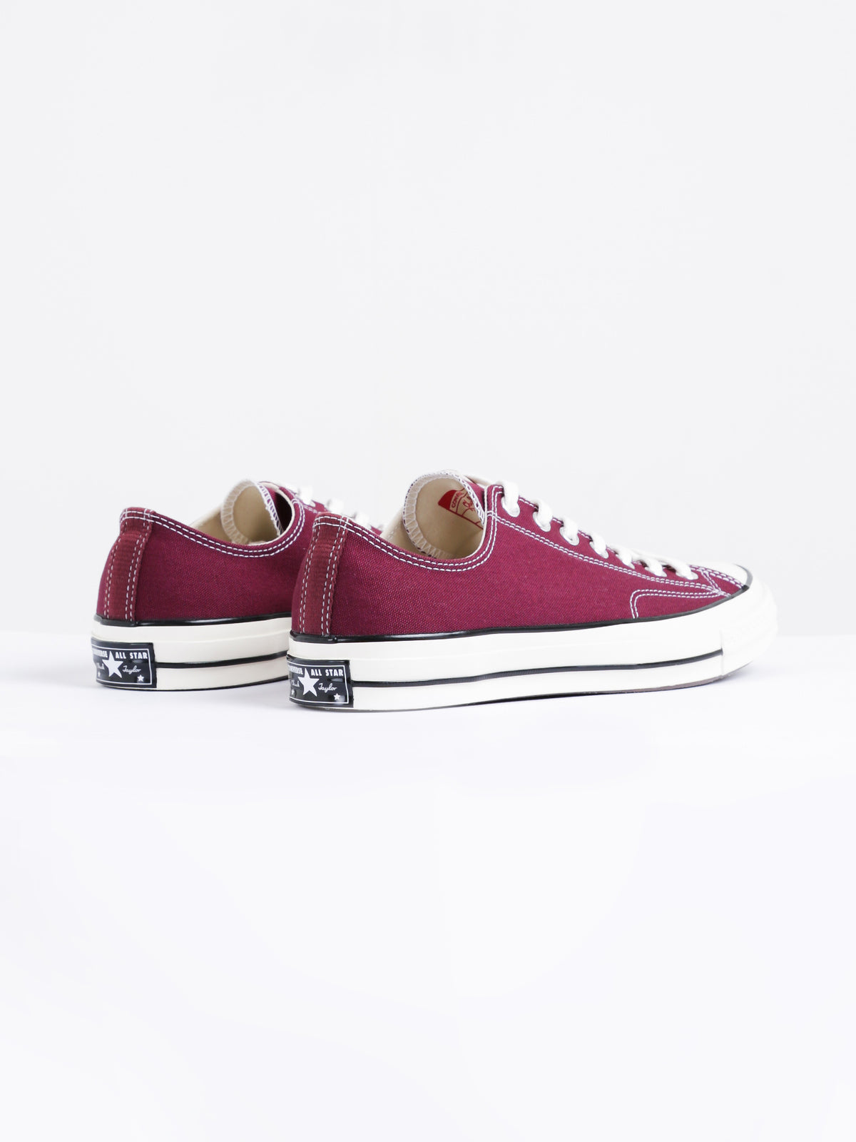 Mens Chuck Taylor All Star Low Top Sneakers in Obsidian Red