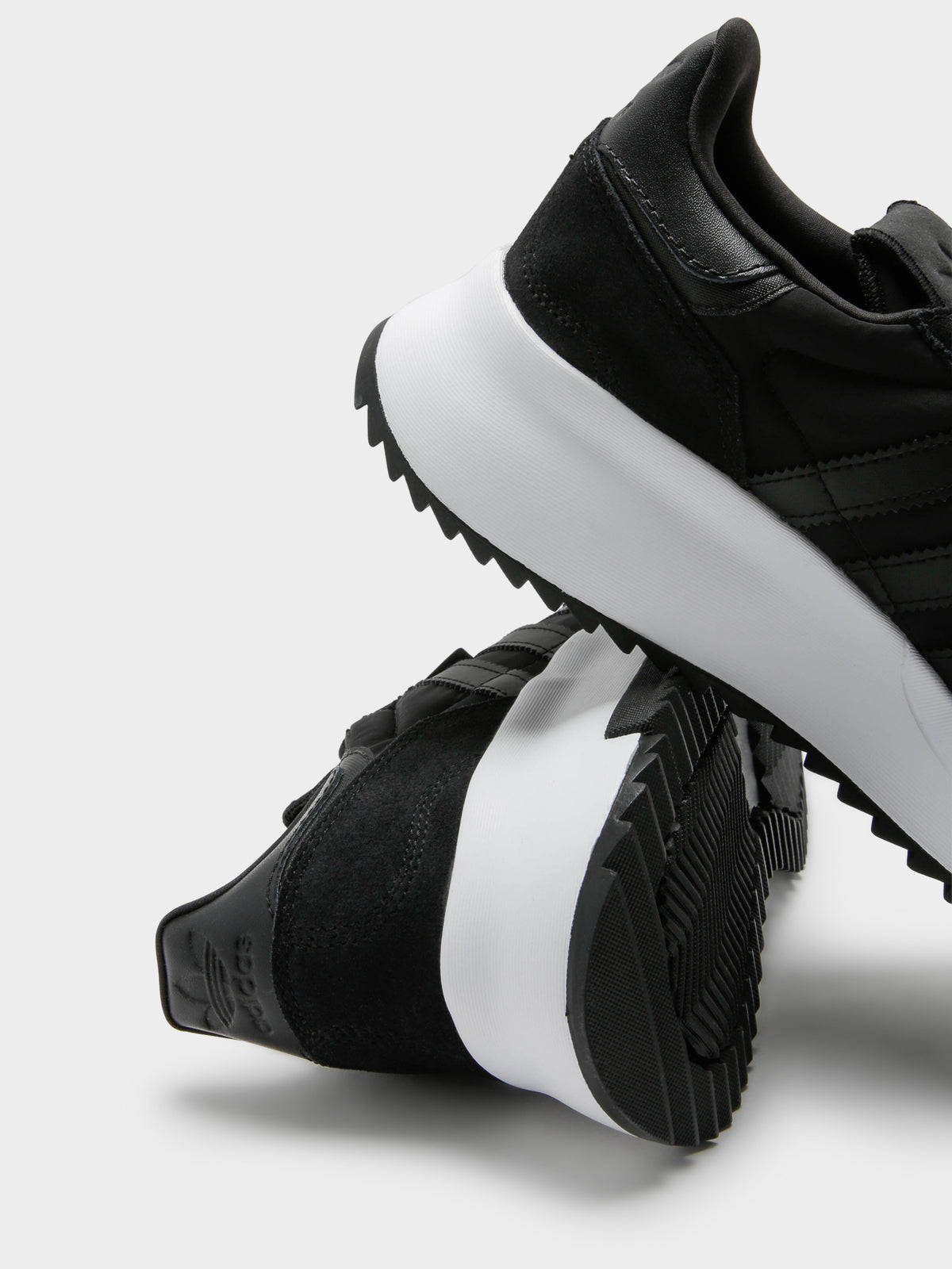 Retropy F2 Sneakers in Core Black &amp; Cloud White
