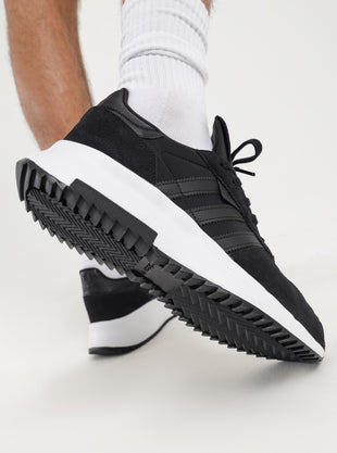 Retropy F2 Sneakers in Core Black & Cloud White