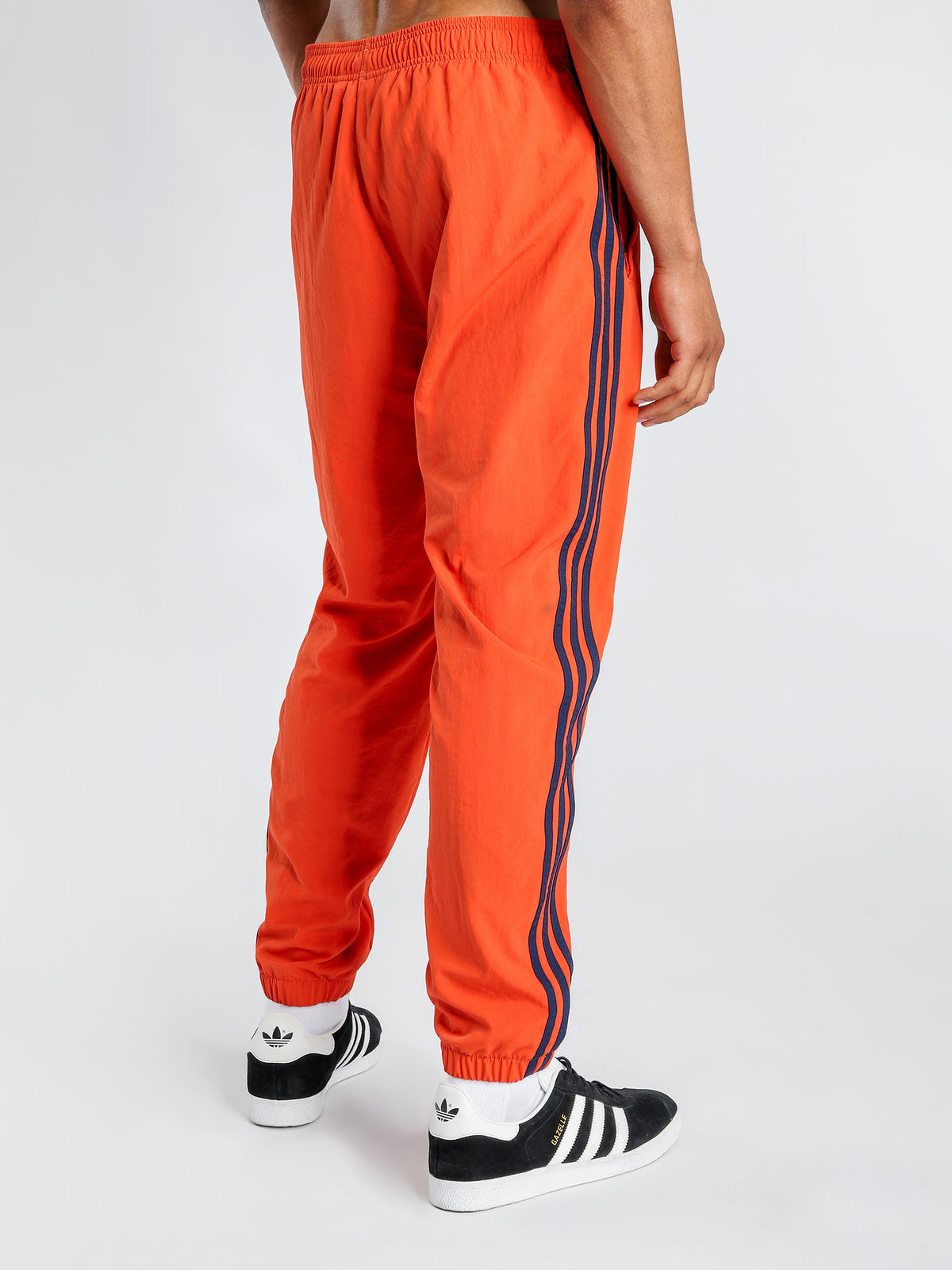 Woven 3 Stripe Tourney Warm Up Pants in Raw Amber