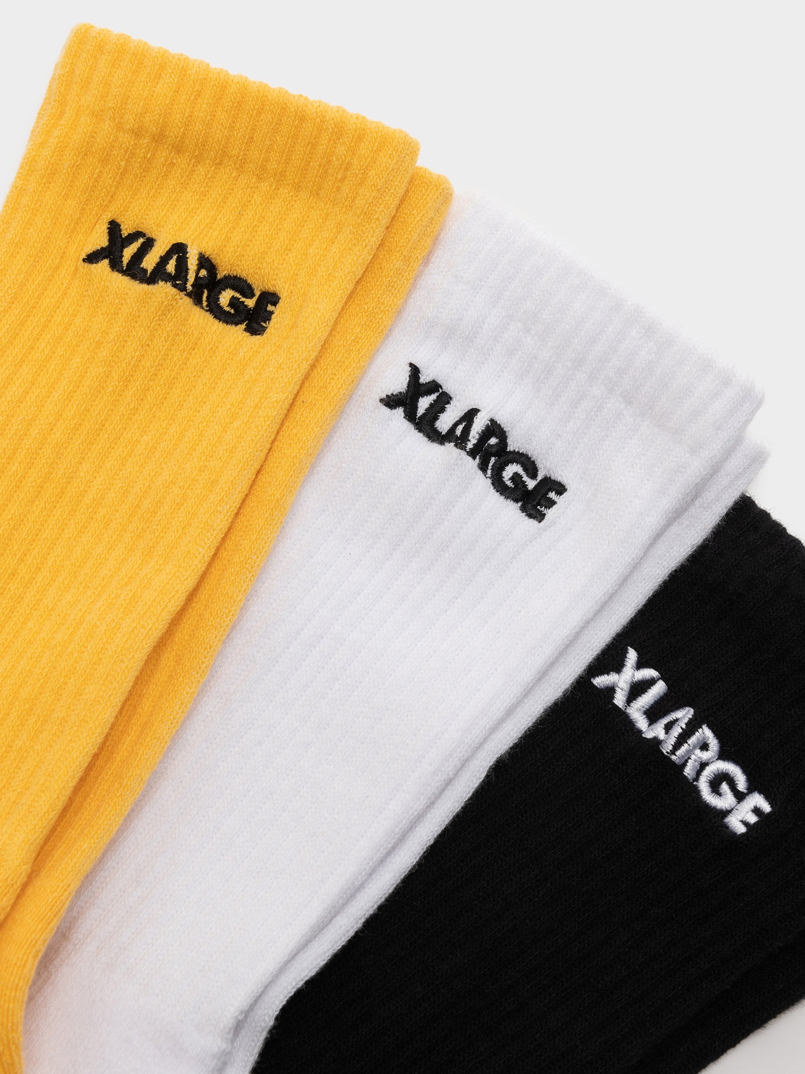 3 Pairs of 91 Text Socks in White, Black & Yellow