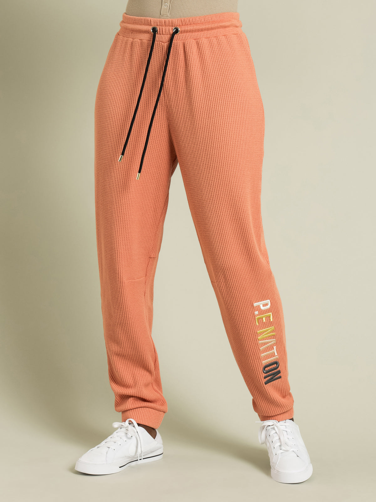 Rebound Trackpants in Coral