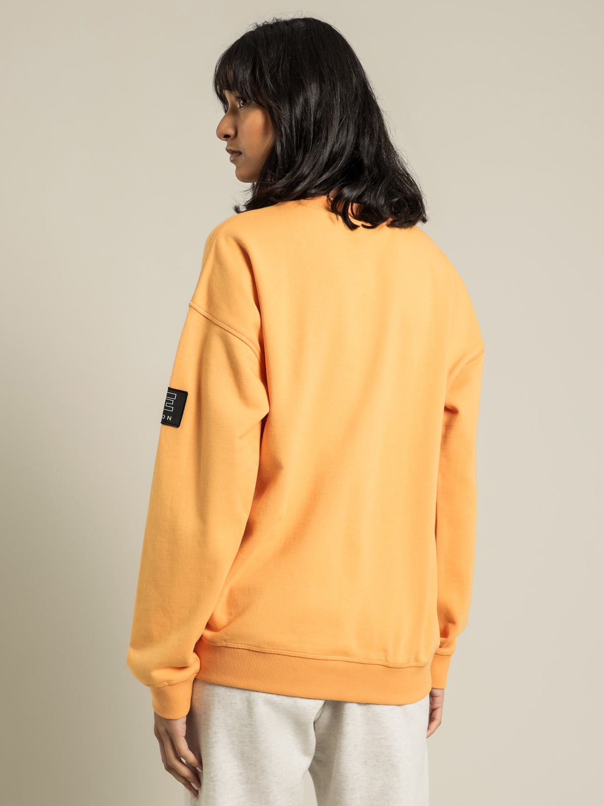 Heads Up Sweatshirt in Orange Light
