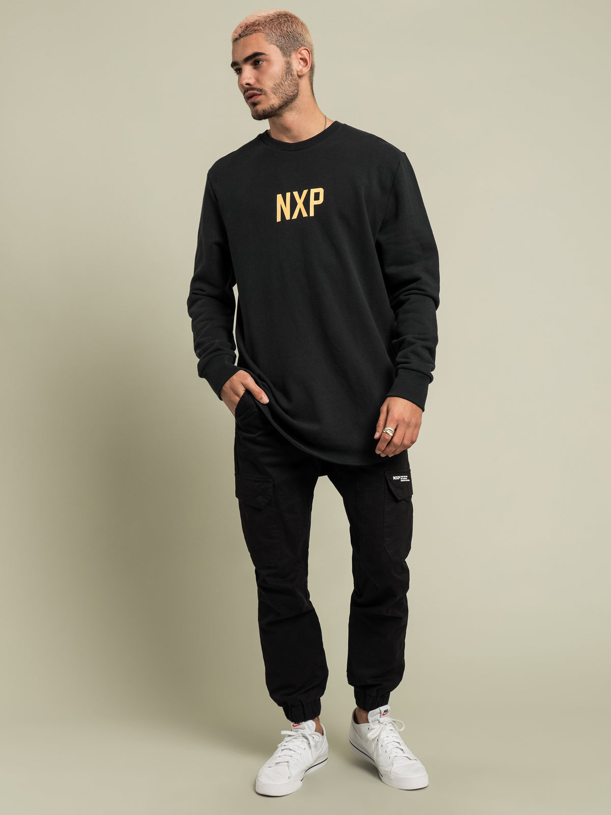 Nena and Pasadena Unfaithful Dual Curved Hem Sweater | Black