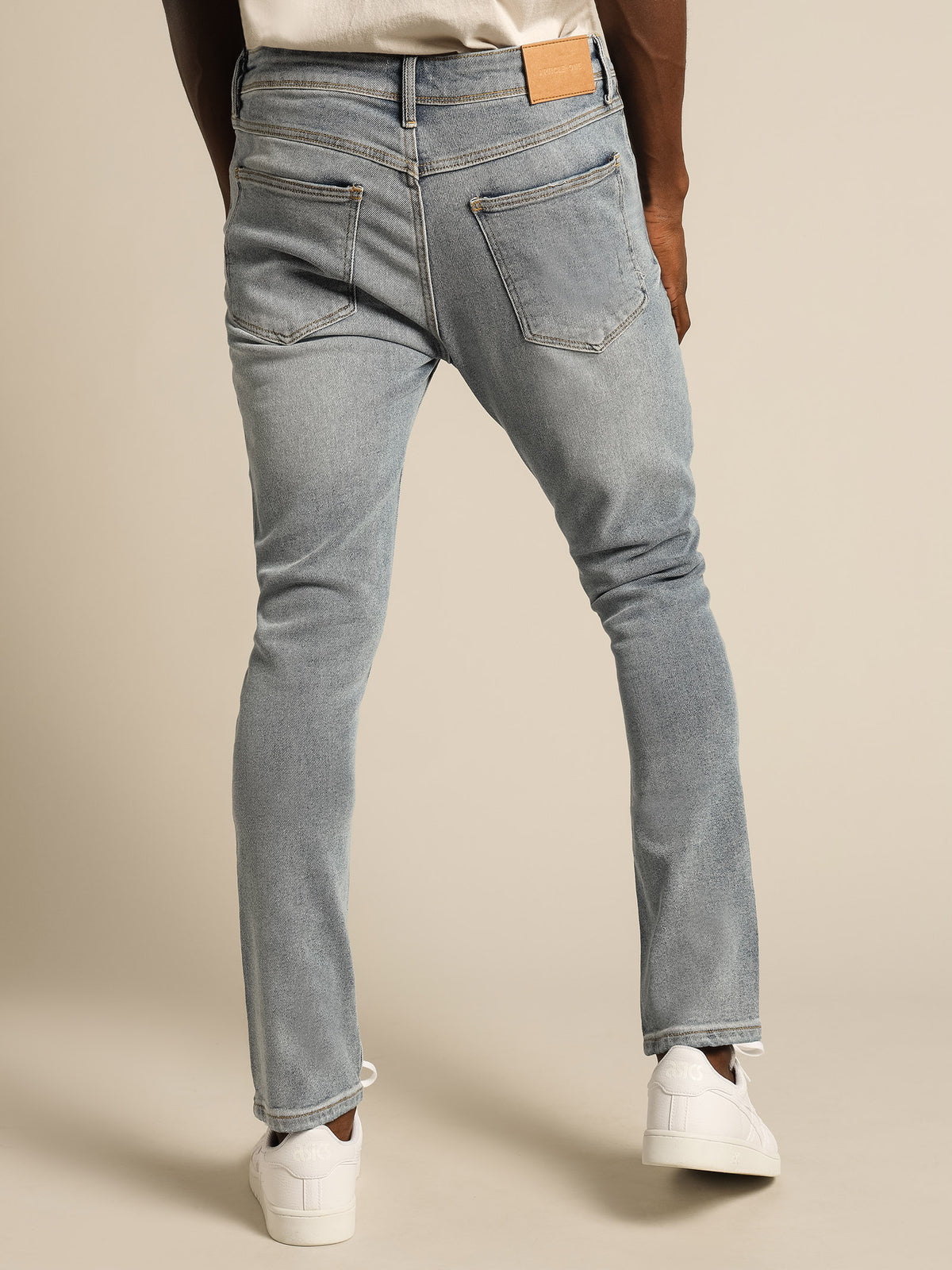 Zane Skinny Jeans in Mid Blue