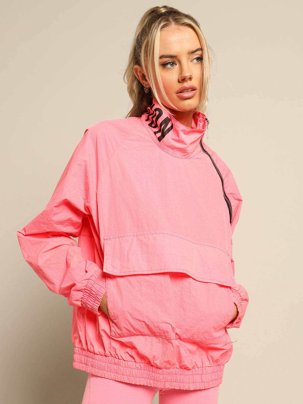 Run About Jacket in Knockout Pink