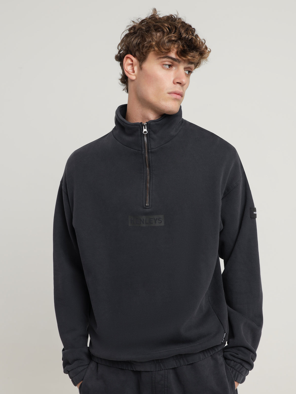 Micro Staple Zip Sweater in Black