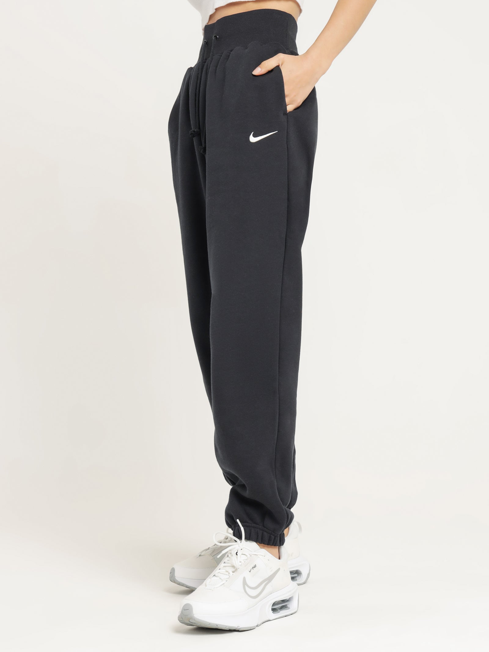 Nike Sportswear Club Fleece Women's Mid-Rise Wide-Leg Tracksuit Bottoms.  Nike IN