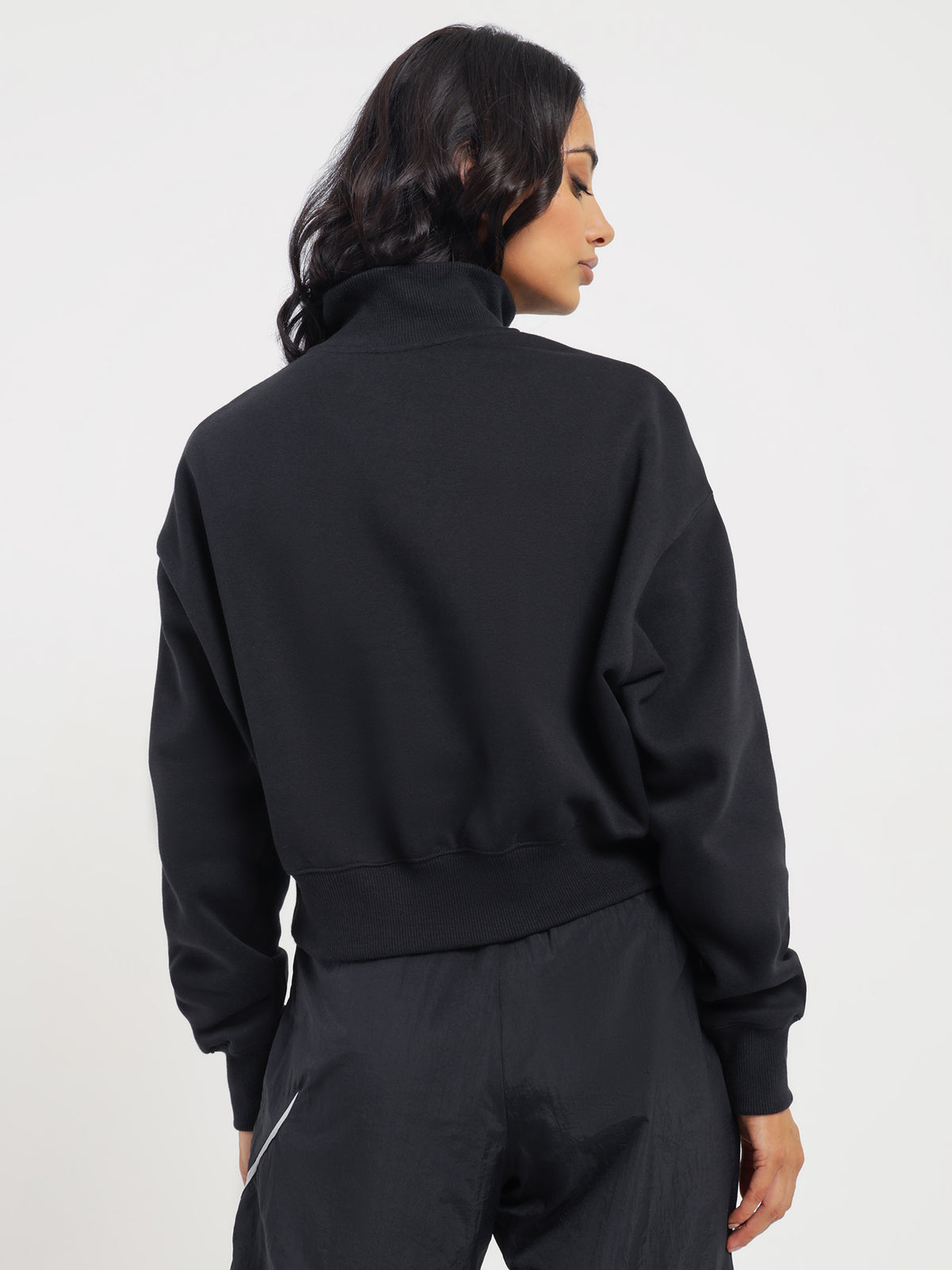 Sportswear Phoenix Fleece Quarter Zip in Black