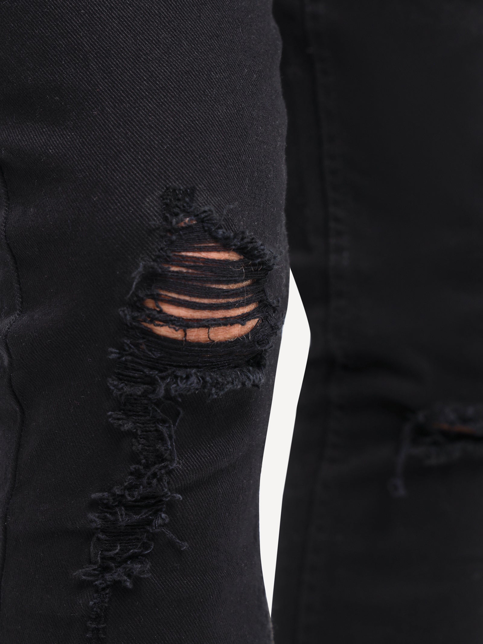 Arden Rip Skinny Jeans