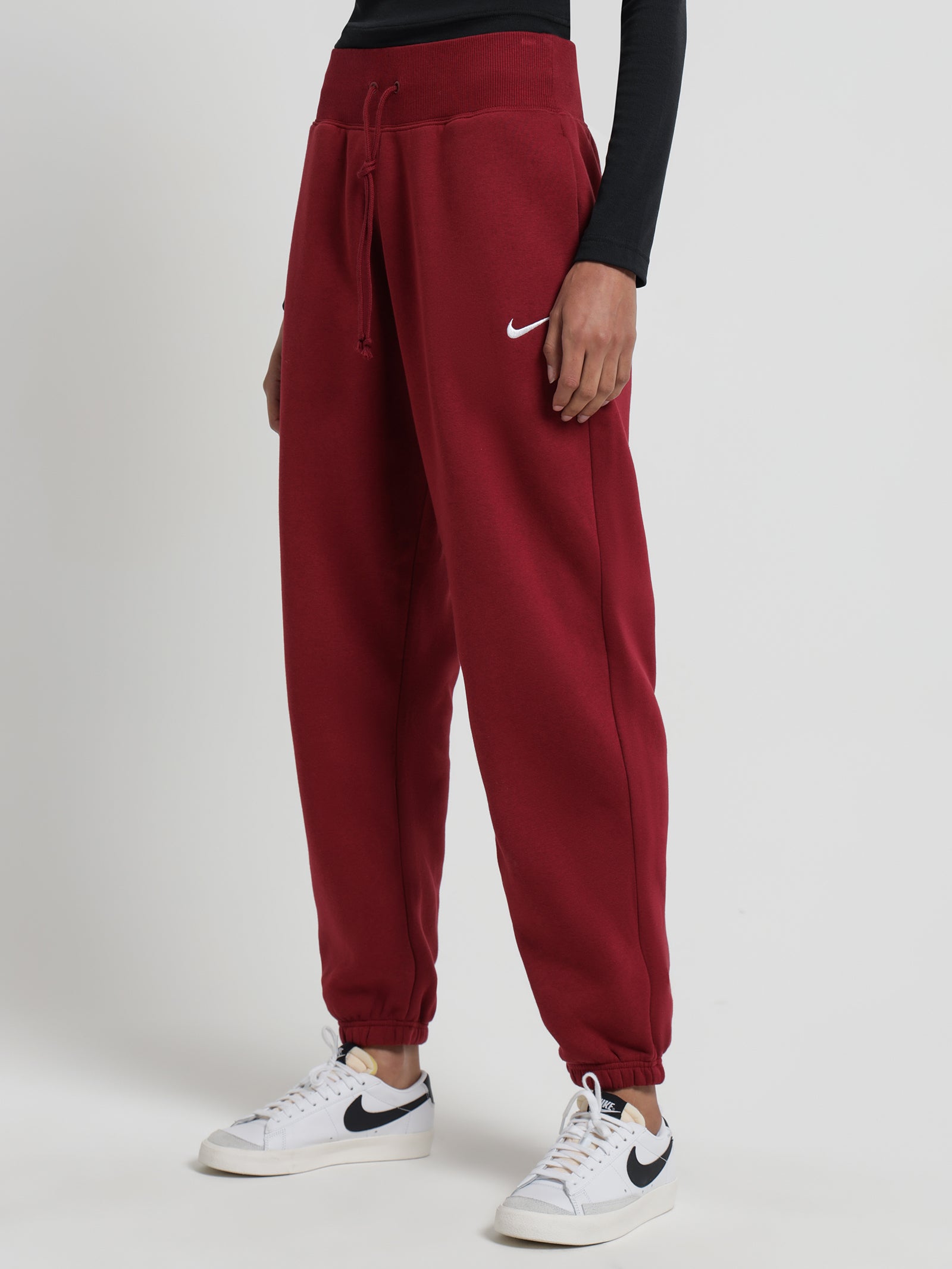Sportswear Phoenix Fleece High-Waisted Oversized Sweatpants in Team Re -  Glue Store