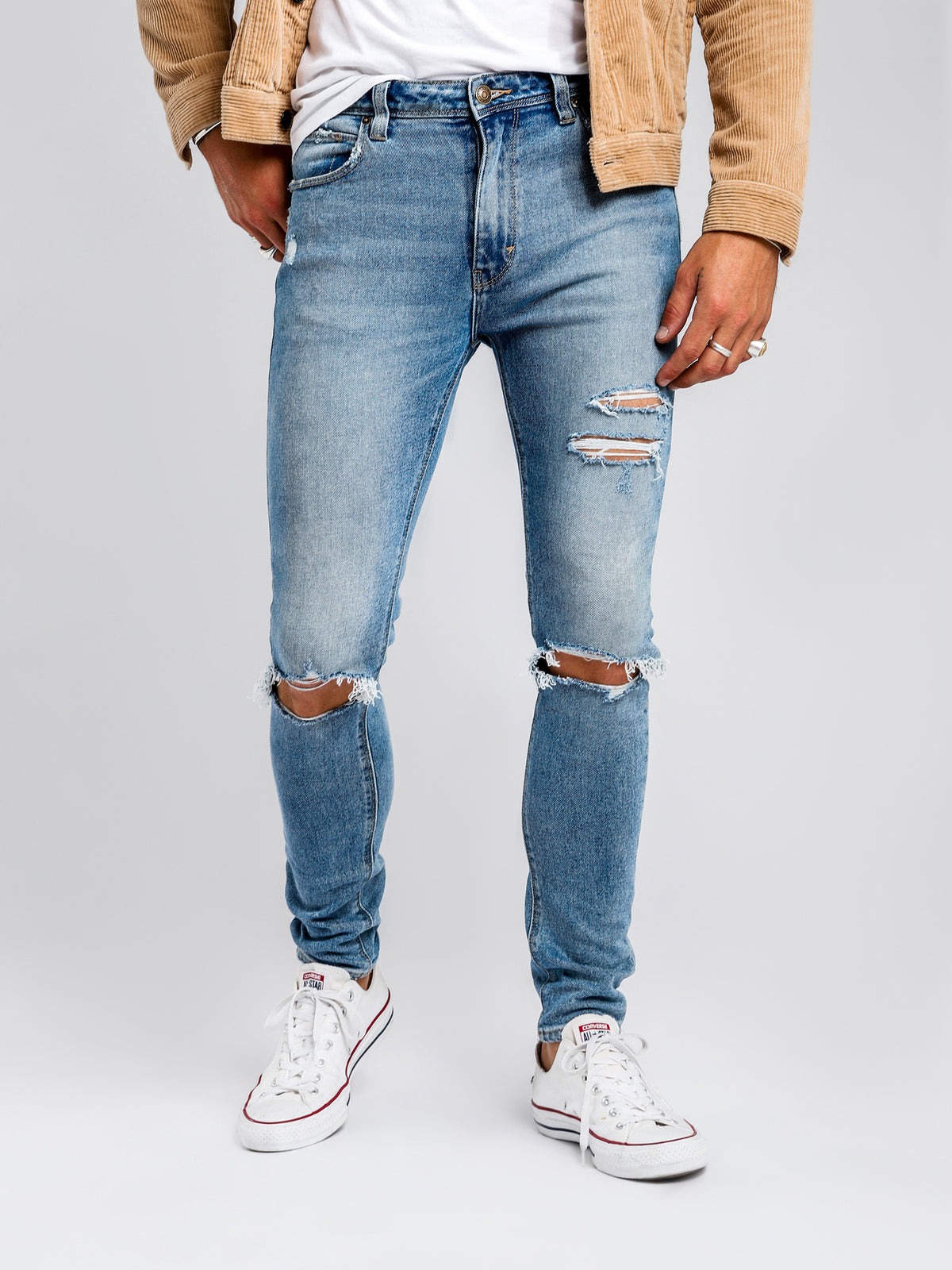 A Dropped Skinny Turn Up Jean in Scuzz Blues Denim