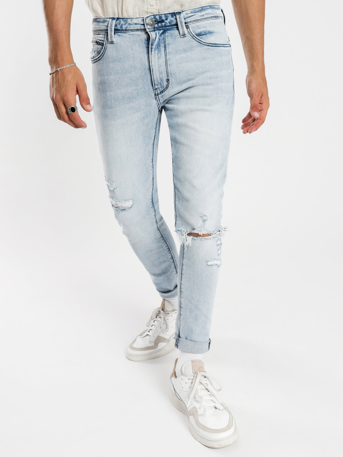 A Dropped Slim Turn Up Jeans Get Shaky Blue Denim