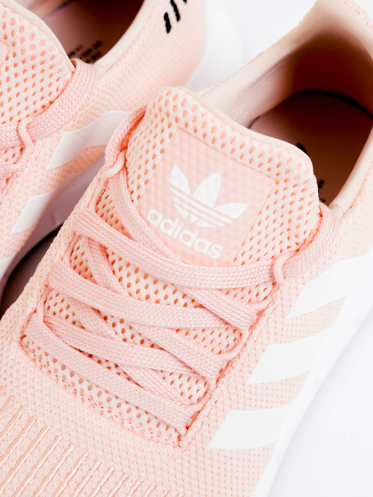 Womens Swift Run Barrier Sneakers in Pink