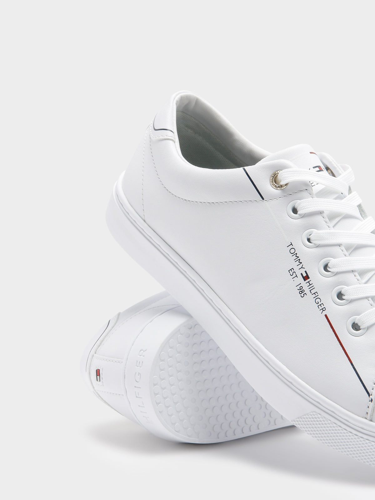 Womens Flat City Leather Sneakers in White