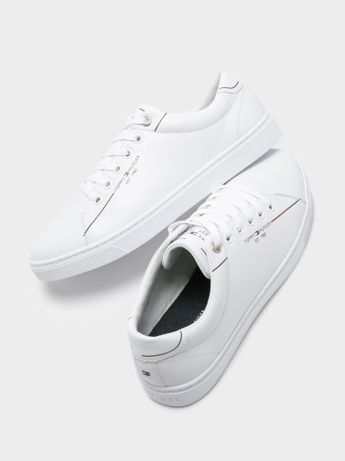 Womens Flat City Leather Sneakers in White
