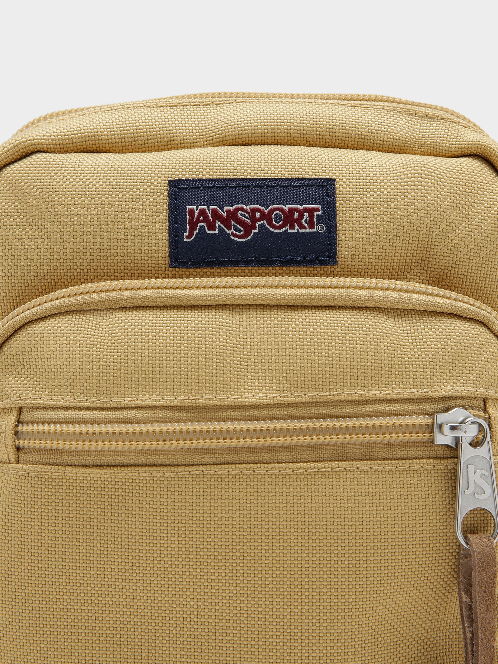 JanSport Core Crossbody Bag - Rugged Cordura & Suede Leather, Multiple Zippered Compartments For Everyday Carry