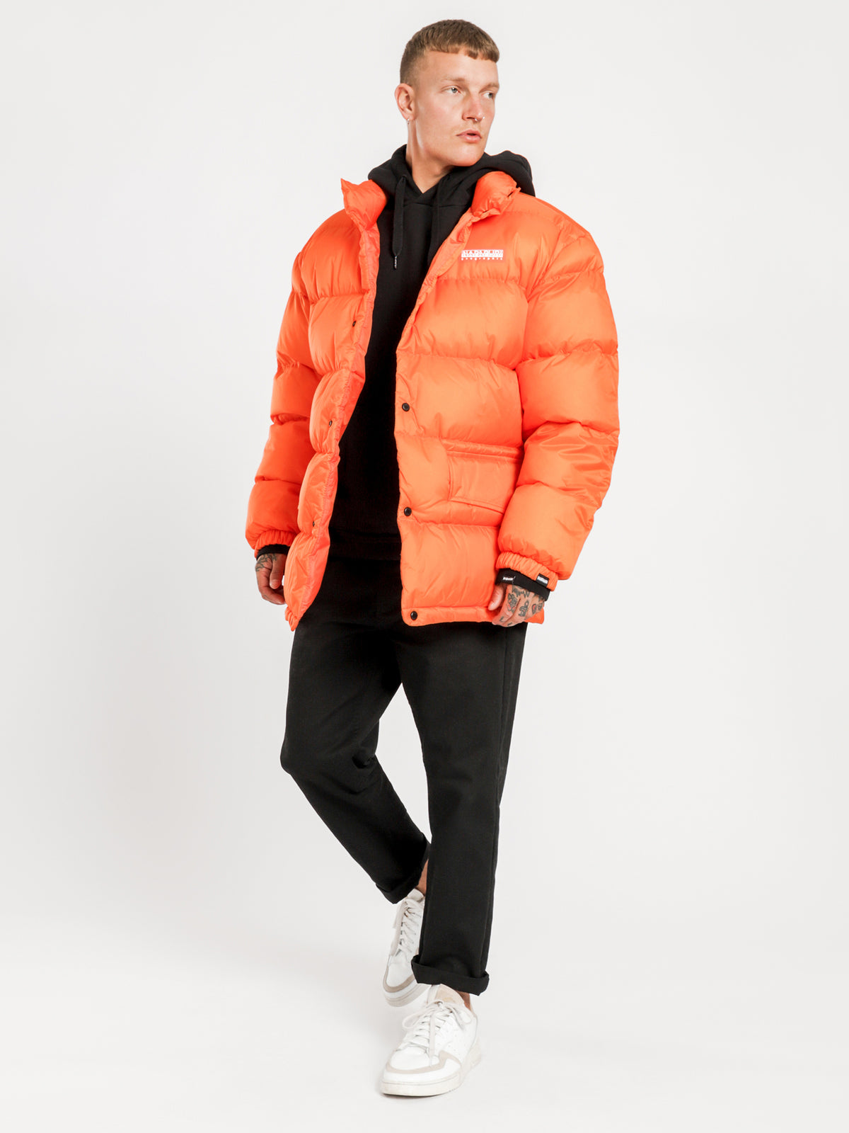 Ari Puffer Jacket in Orange Puffin