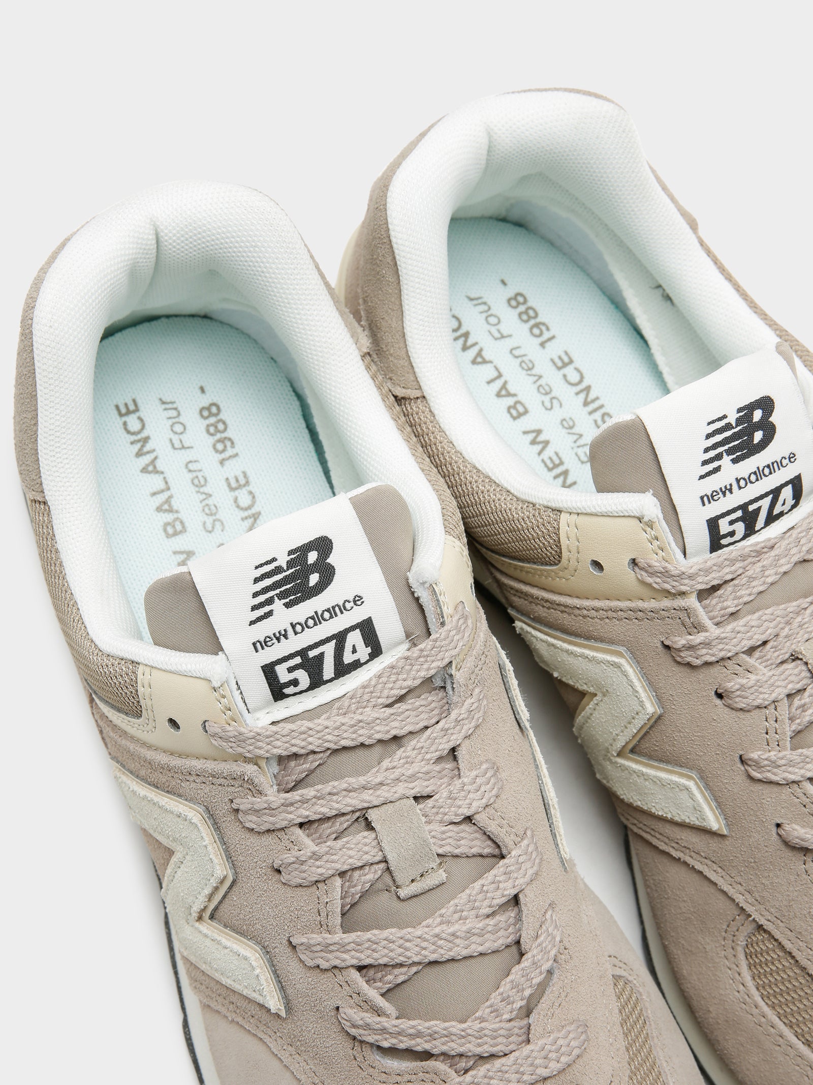 New Balance Unisex 574 Sneakers Brown/Crea Glue Store