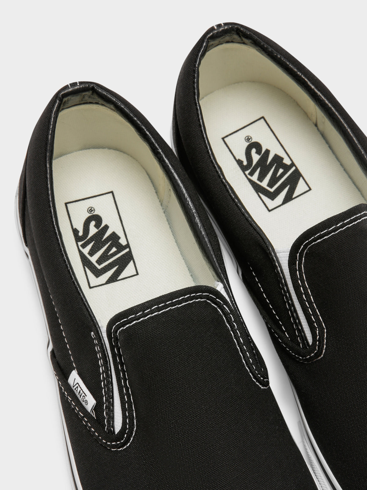 Unisex Classic Slip-On Sneakers in Black &amp; White