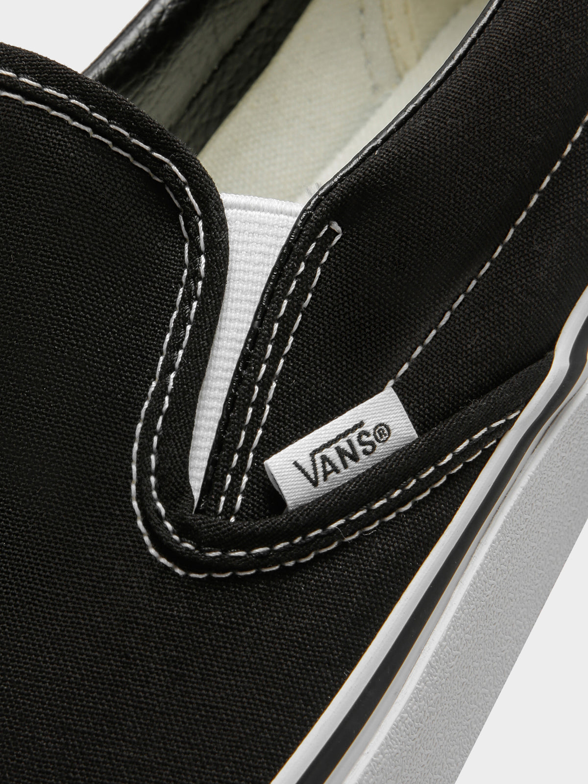 Unisex Classic Slip-On Sneakers in Black &amp; White
