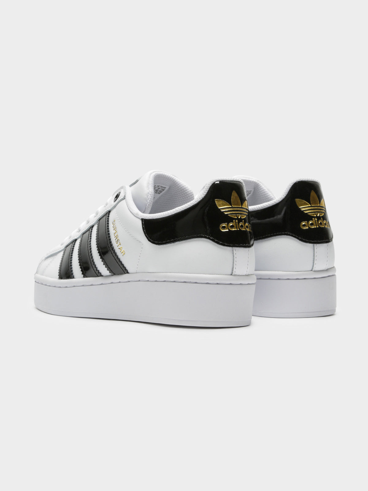 Womens Superstar Bold Sneakers in Black White &amp; Gold
