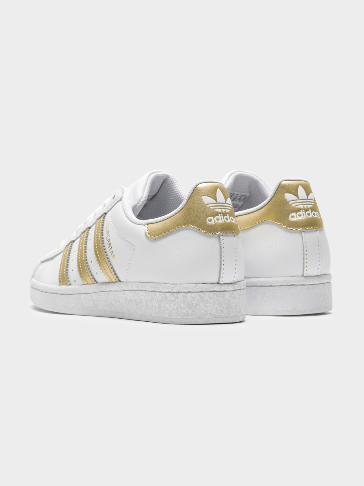 Womens Superstar Sneakers in White &amp; Gold